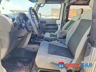 Zdjęcie 7 z 12 samochodu: 2010 JEEP WRANGLER SPORT VIN:1J4AA2D10AL167632 - miniatura
