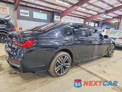 Trzecie zdjęcie samochodu z tyłu: 2021 BMW 750 XI VIN:WBA7U2C07MCF68499 - miniatura