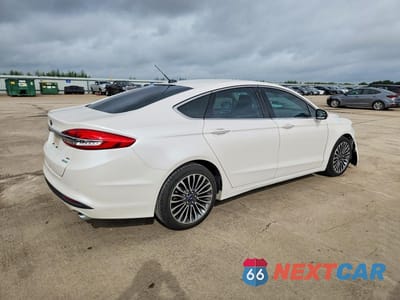Trzecie zdjęcie samochodu z tyłu: 2018 FORD FUSION SE VIN:3FA6P0HD9JR280859 - miniatura