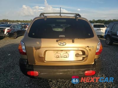 Zdjęcie 6 z 12 samochodu: 2004 HYUNDAI SANTA FE GLS VIN:KM8SC13D44U842807 - miniatura