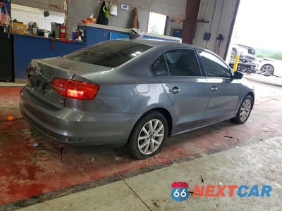Trzecie zdjęcie samochodu z tyłu: 2015 VOLKSWAGEN JETTA SE VIN:3VWD17AJ1FM331350 - miniatura