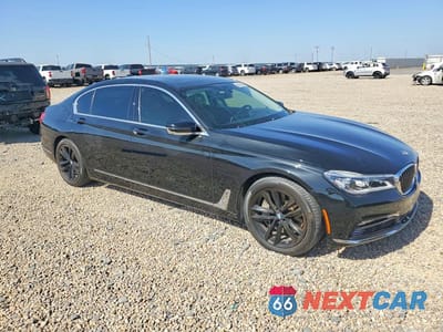 Czwarte zdjęcie samochodu z boku: 2016 BMW 750 XI VIN:WBA7F2C55GG415698 - miniatura