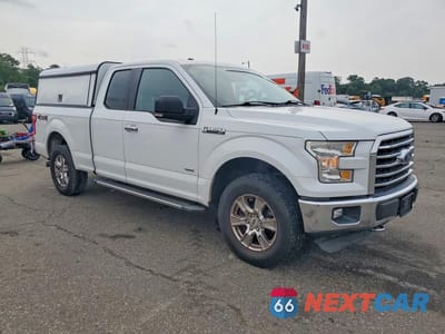 Czwarte zdjęcie samochodu z boku: 2015 FORD F150 SUPER CAB VIN:1FTEX1EP9FFC44832 - miniatura