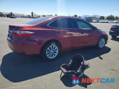 Trzecie zdjęcie samochodu z tyłu: 2016 TOYOTA CAMRY HYBRID LE VIN:4T1BD1FK2GU199692 - miniatura