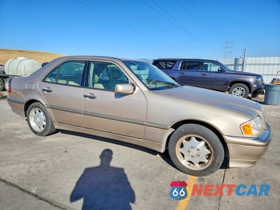 Czwarte zdjęcie samochodu z boku: 2000 MERCEDES-BENZ C 230 VIN:WDBHA24G0YA834468 - miniatura
