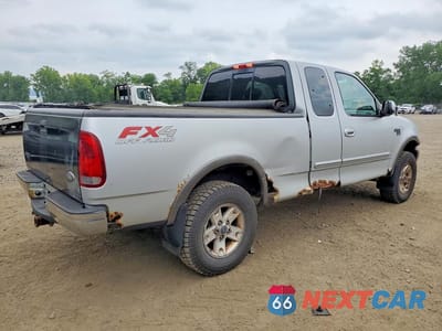 Trzecie zdjęcie samochodu z tyłu: 2003 FORD F150 VIN:1FTRX18L03NA92385 - miniatura