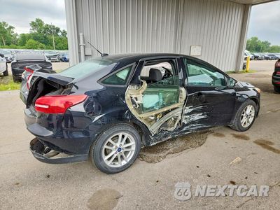 Trzecie zdjęcie samochodu z tyłu: 2016 FORD FOCUS SE VIN:1FADP3F27GL247716 - miniatura