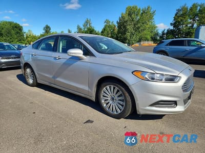 Czwarte zdjęcie samochodu z boku: 2015 FORD FUSION SE HYBRID VIN:3FA6P0LU4FR226996 - miniatura