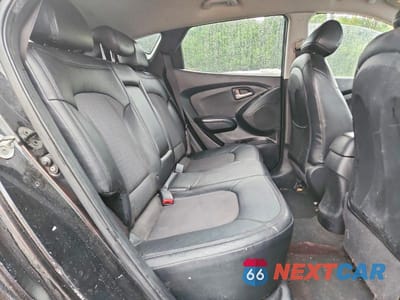 Zdjęcie 11 z 14 samochodu: 2010 HYUNDAI TUCSON GLS VIN:KM8JUCAC3AU084520 - miniatura