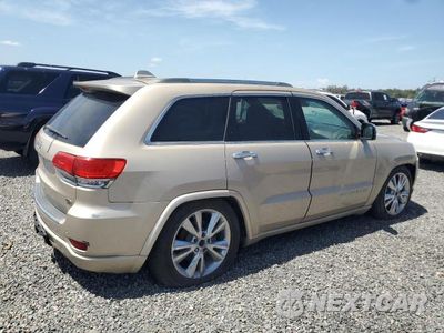 Trzecie zdjęcie samochodu z tyłu: 2014 JEEP GRAND CHEROKEE OVERLAND VIN:1C4RJFCT4EC148025 - miniatura