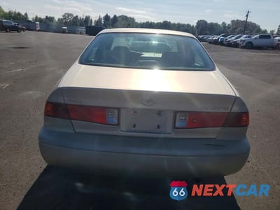 Zdjęcie 6 z 12 samochodu: 2000 TOYOTA CAMRY LE VIN:JT2BG22K2Y0425707 - miniatura