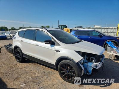 Czwarte zdjęcie samochodu z boku: 2017 FORD ESCAPE TITANIUM VIN:1FMCU9J90HUB43906 - miniatura
