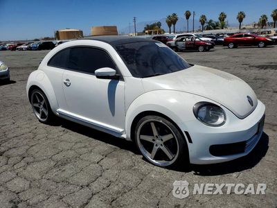 Czwarte zdjęcie samochodu z boku: 2012 VOLKSWAGEN BEETLE VIN:3VWJP7AT0CM627037 - miniatura
