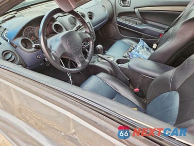 Zdjęcie 7 z 12 samochodu: 2003 MITSUBISHI ECLIPSE SPYDER GTS VIN:4A3AE75H73E025155 - miniatura