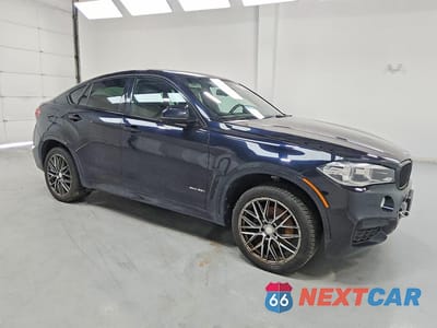 Czwarte zdjęcie samochodu z boku: 2015 BMW X6 XDRIVE35I VIN:5UXKU2C50F0F96088 - miniatura