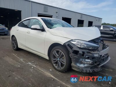 Czwarte zdjęcie samochodu z boku: 2021 BMW 228I VIN:WBA53AK07M7J17424 - miniatura