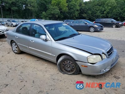 Czwarte zdjęcie samochodu z boku: 2006 KIA OPTIMA LX VIN:KNAGD126X65462083 - miniatura