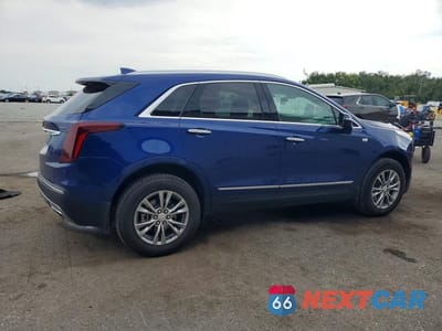 Trzecie zdjęcie samochodu z tyłu: 2023 CADILLAC XT5 PREMIUM LUXURY VIN:1GYKNCR48PZ138130 - miniatura