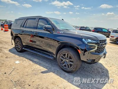 Czwarte zdjęcie samochodu z boku: 2023 CHEVROLET TAHOE K1500 Z71 VIN:1GNSKPKD9PR161083 - miniatura