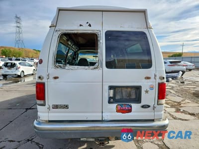 Zdjęcie 6 z 13 samochodu: 1999 FORD ECONOLINE E350 SUPER DUTY WAGON VIN:1FBSS31L9XHB43252 - miniatura