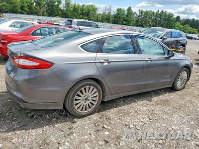 Trzecie zdjęcie samochodu z tyłu: 2013 FORD FUSION SE HYBRID VIN:3FA6P0LU0DR233294 - miniatura