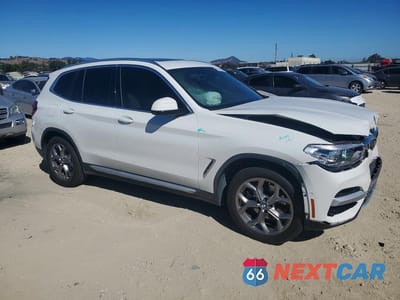 Czwarte zdjęcie samochodu z boku: 2020 BMW X3 XDRIVE30I VIN:5UXTY5C01L9B91914 - miniatura