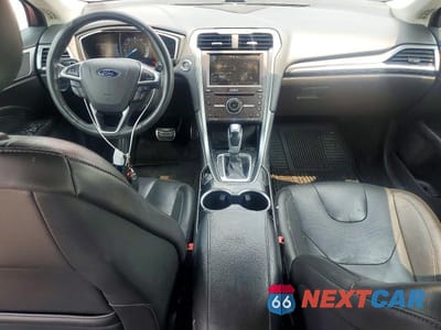 Zdjęcie 8 z 12 samochodu: 2016 FORD FUSION TITANIUM VIN:3FA6P0K9XGR400326 - miniatura