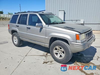 Czwarte zdjęcie samochodu z boku: 1998 JEEP GRAND CHEROKEE LIMITED 5.9L VIN:1J4GZ88Z3WC162700 - miniatura