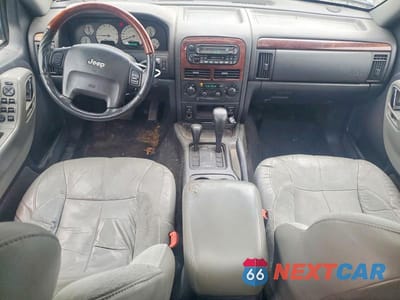 Zdjęcie 8 z 13 samochodu: 2003 JEEP GRAND CHEROKEE OVERLAND VIN:1J8GW68J53C555955 - miniatura