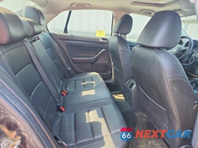 Zdjęcie 10 z 12 samochodu: 2010 VOLKSWAGEN JETTA WOLFSBURG VIN:3VWRJ7AJ6AM037831 - miniatura