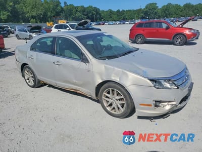 Czwarte zdjęcie samochodu z boku: 2010 FORD FUSION SEL VIN:3FAHP0JGXAR206010 - miniatura