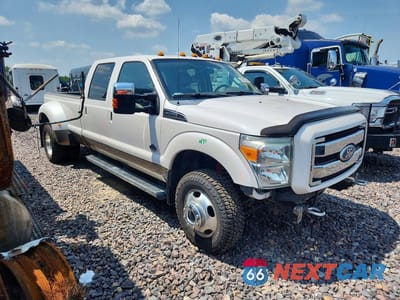 Czwarte zdjęcie samochodu z boku: 2011 FORD F350 SUPER DUTY VIN:1FT8W3DT7BEB24490 - miniatura