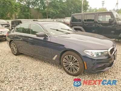 Czwarte zdjęcie samochodu z boku: 2018 BMW 530 XI VIN:WBAJA7C55JWC75668 - miniatura