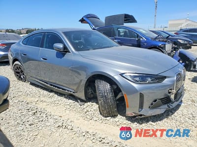Czwarte zdjęcie samochodu z boku: 2024 BMW I4 EDRIVE 35 VIN:WBY43AW06RFT21488 - miniatura