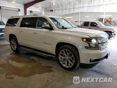 Czwarte zdjęcie samochodu z boku: 2017 CHEVROLET SUBURBAN K1500 PREMIER VIN:1GNSKJKC9HR204004 - miniatura