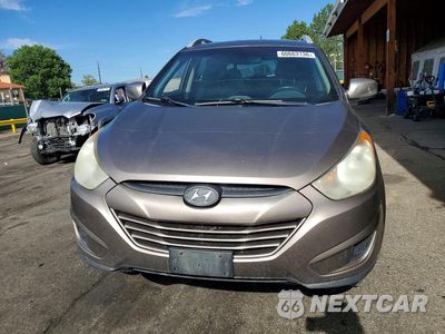 Piąte zdjęcie samochodu w środku: 2011 HYUNDAI TUCSON GLS VIN:KM8JUCACXBU119622 - miniatura
