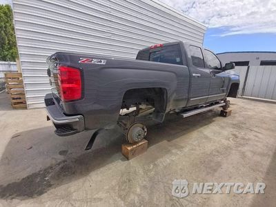 Trzecie zdjęcie samochodu z tyłu: 2014 CHEVROLET SILVERADO K1500 LTZ VIN:1GCVKSEC7EZ124493 - miniatura