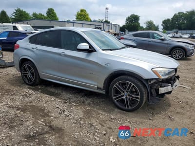 Czwarte zdjęcie samochodu z boku: 2016 BMW X4 XDRIVE28I VIN:5UXXW3C55G0M89879 - miniatura