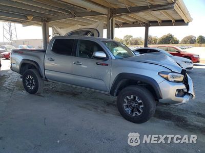 Czwarte zdjęcie samochodu z boku: 2022 TOYOTA TACOMA TRD OFF-ROAD VIN:3TYCZ5AN0NT077678 - miniatura
