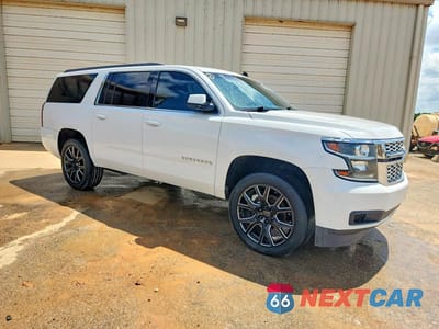 Czwarte zdjęcie samochodu z boku: 2015 CHEVROLET SUBURBAN C1500 LS VIN:1GNSCHKC0FR250632 - miniatura