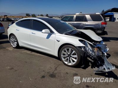 Czwarte zdjęcie samochodu z boku: 2018 TESLA MODEL 3 VIN:5YJ3E1EA4JF049307 - miniatura