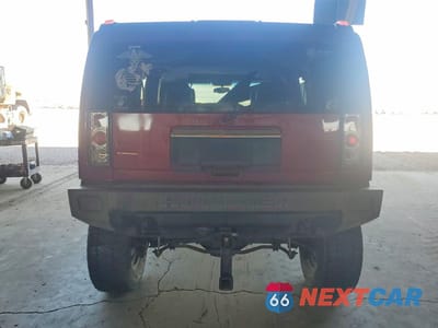 Zdjęcie 6 z 12 samochodu: 2003 HUMMER H2 VIN:5GRGN23U83H144409 - miniatura