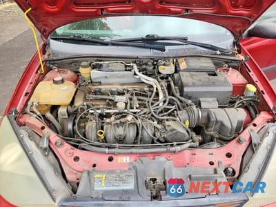 Zdjęcie 11 z 12 samochodu: 2003 FORD FOCUS LX VIN:1FAFP33Z83W302984 - miniatura