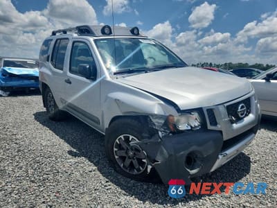 Czwarte zdjęcie samochodu z boku: 2014 NISSAN XTERRA PRO-4X VIN:5N1AN0NW5EN815383 - miniatura
