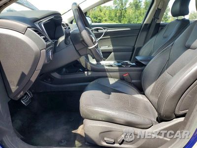 Zdjęcie 7 z 12 samochodu: 2016 FORD FUSION TITANIUM PHEV VIN:3FA6P0SU7GR316470 - miniatura