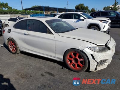 Czwarte zdjęcie samochodu z boku: 2016 BMW M235I VIN:WBA1J7C5XGV360226 - miniatura