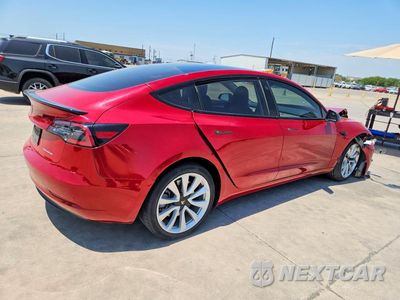 Trzecie zdjęcie samochodu z tyłu: 2023 TESLA MODEL 3 VIN:5YJ3E1EA0PF545522 - miniatura
