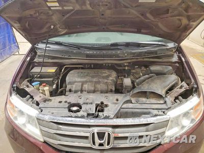 Zdjęcie 12 z 14 samochodu: 2011 HONDA ODYSSEY EXL VIN:5FNRL5H6XBB074535 - miniatura