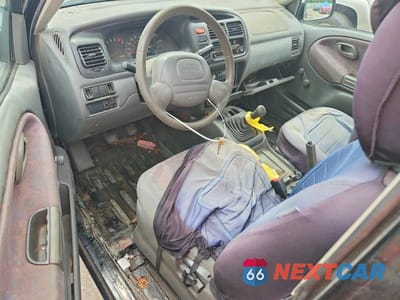 Zdjęcie 8 z 13 samochodu: 1999 CHEVROLET TRACKER VIN:2CNBE1867X6929902 - miniatura