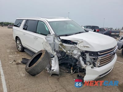 Czwarte zdjęcie samochodu z boku: 2021 CHEVROLET SUBURBAN K1500 HIGH COUNTRY VIN:1GNSKGKL4MR403359 - miniatura